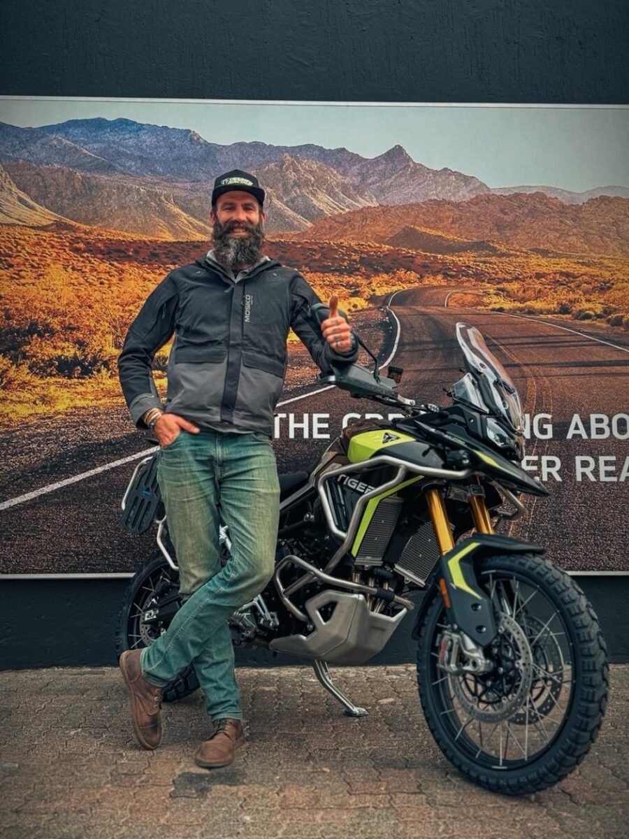 Off-road motorcycle stuck in muddy Lesotho track near Molotonyani Waterfall