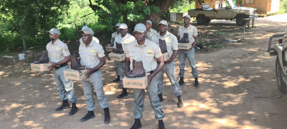 Northern Tuli rangers holding Jim Green boot boxes